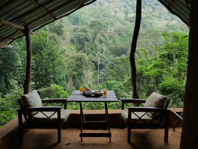 Knuckles Backpackers Hut with waterfall view