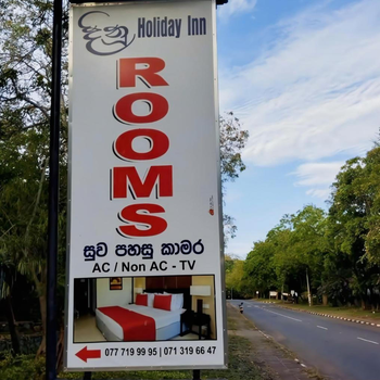 New Dinu Holiday Inn - Hotel exterior or room view